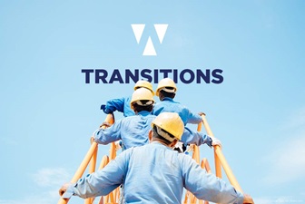 Men in hard hats climbing stairs toward SWANA Transitions logo